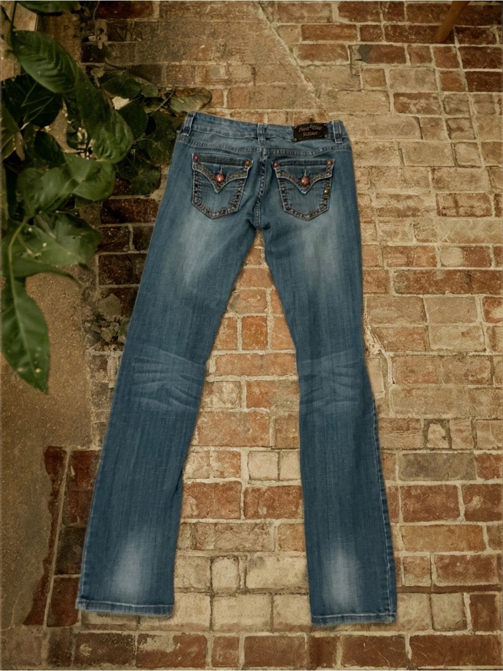 Antique Rivet Women's faded blue bootcut jeans